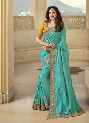 Grab These Designer Saree in Fine Colored Pair With Desiggner Blouse.These Saree And Blouse Are Fabricated On Art Silk.Its Beautified With Heavy Designer Embroidery Work.