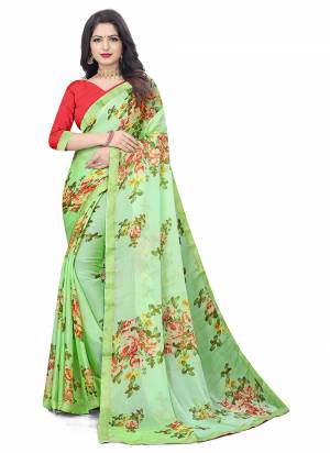 Grab These Casual Wear Saree in Fine Colored.These Saree is Fabricated On Chiffon Pair With Art Slk Blouse.Its Beautified With Designer Printed Work.