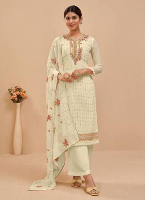 Look Pretty Wearing This Beatiful Colored Suit.These Suit And Dupatta Are Fabricated On Georgette Pair With Santoon Bottom.Its Beautified With Heavy Designer Work.