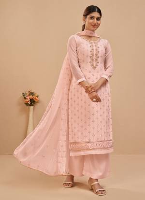 Look Pretty Wearing This Beatiful Colored Suit.These Suit And Dupatta Are Fabricated On Georgette Pair With Santoon Bottom.Its Beautified With Heavy Designer Work.