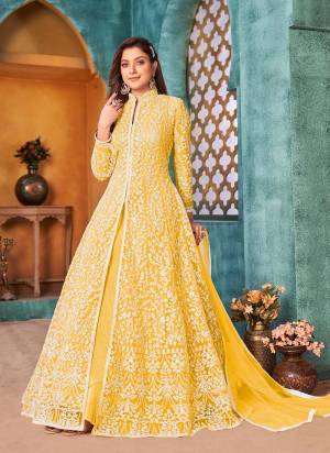 Here Is An Attractive Looking Beautiful Colored Suit.These Suit And Dupatta is Fabricated On Net Pair With Santoon Bottom.Its Beautified With Cording,Sequance Embroidery Work. 