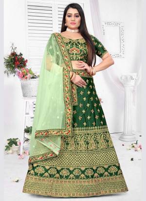 For A Proper Look,Grab These Designer Lehenga Choli in Fine Colored.These Lehenga And Blouse Are Fabricated On Malay Satin Silk Pair With Net Dupatta.Its Beautified With Heavy Designer Work.