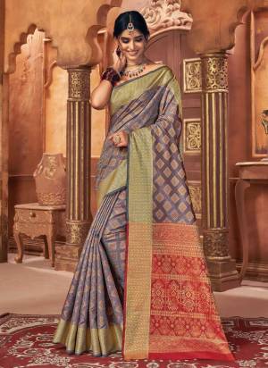 Grab These Beautiful Saree Come With Pretty Blouse.These Saree And Blouse Are Fabricated On Patola Silk.Its Beautified With Heavy Jari Wevon Designer Work.