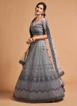 For A Designer Look,Grab These Designer Lehehnga in All Over Fine Colored.These Lehenga And Blouse Are Fabricated On Soft Net Pair With Soft Net Dupatta.Its Beautified With Designer Work.