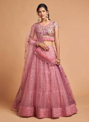 For A Designer Look,Grab These Designer Lehehnga in All Over Fine Colored.These Lehenga And Blouse Are Fabricated On Soft Net Pair With Soft Net Dupatta.Its Beautified With Designer Work.