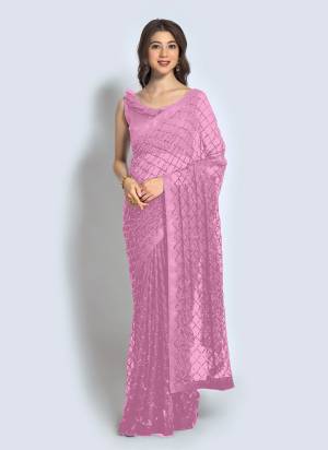 Grab These Saree in Fine Colored.These Saree is Fabricated On Georgette Pair With Banglori Silk Blouse.Its Beautified With Designer Sequance Embroidery Work.