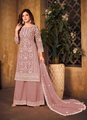 Grab These Plazzo Suit in All Over Fine Colored.These Top And Dupata Are Fabricated On Net Pair With Santoon Bottom.Its Beautified With Heavy Cording Embroidery Work.