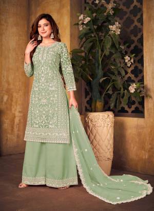 Grab These Plazzo Suit in All Over Fine Colored.These Top And Dupata Are Fabricated On Net Pair With Santoon Bottom.Its Beautified With Heavy Cording Embroidery Work.