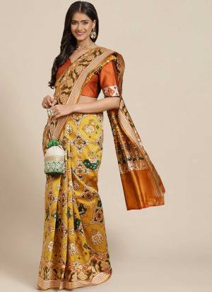 Grab These Beautiful Colored Festive Wear Saree.These Saree And Blouse Are Fabricated On Banarasi Silk.Its Beautified With Wevon Patola Designer Work.