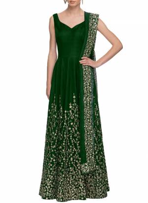 Grab These Designer Gown in Fine Colored.These Gown is Fabricated On Art Silk Pair With Soft Net Dupatta.Its Beautified With Designer Hand Work.Buy now