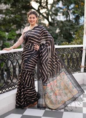 For A Beautiful Look,Grab These Saree in All Over Fine Colored.These Saree is Fabricated On Tussae Silk Pair With Art Silk Blouse.Its Beautified With Wevon Jari Border,Laheriya Printed Work.