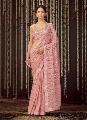 Grab These Saree in All Over Fine Colored Pair With Pretty Colored Blouse.These Saree is Fabricated On Art Silk Pair With Georgette Blouse.Its Beautified With Heavy Thread,Sequance Embroidery Work.