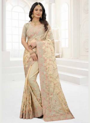 Grab These Saree in Fine Colored Pair With Matching Colored Blouse.These Saree And Blouse Are Fabricated On Organza.its Beautified With Designer Work.