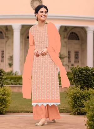 For A Casual Wear,Grab These Dress Materil Come With Fine Colored.These Top is Fabricated On Georgette Pair With American Bottom And Nazneen Dupatta.Its Beautified With Designer Sipli Embroidery Work.