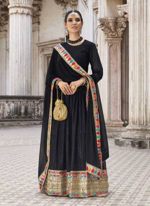 Grab These Anarkali Suit Come With All Over Black Colored.These Top And Dupatta is Fabricated On Georgette Pair With Santoon Bottom.Its Beautified With Designer Heavy Sequance Embroidery Work.