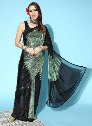 Grab These Saree in Fine Colored Pair With Black Colored Blouse.These Saree is Fabricated On Georgette Pair With Satin Banglori Blouse.Its Fabricated On Designer Sequance Embroidery Work.