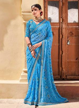 Grab These Saree in Fine Colored.These Saree is Fabricated On Chiffon Pair With  Banglori Silk Blouse.Its Beautified With Designer Work.Buy Now These Beautiful Saree.