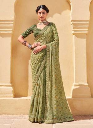 Grab These Saree in Fine Colored.These Saree is Fabricated On Chiffon Pair With  Banglori Silk Blouse.Its Beautified With Designer Work.Buy Now These Beautiful Saree.