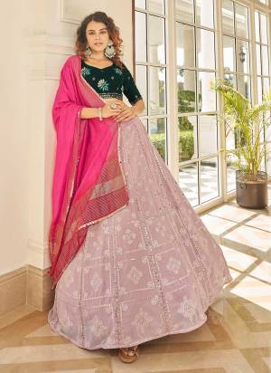 For A Designer Look,Grab These Beautiful Colored Lehenga Choli Pair With Designer Blouse And Dupatta.These Lehenga And Blouse Are Fabricated On Georgette Pair With Georgette Dupatta.Its Beautified With Designer Work. 