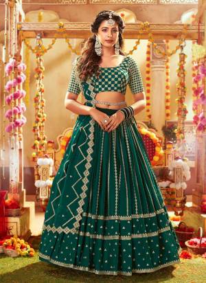 You Will Definitely Earn Lots Of Compliments Wearing This Heavy Designer Lehenga Choli In All Over Fine Color. Its Pretty Blouse, Lehenga and Dupatta Are Fabricated On Faux Georgette Beautified With Sequance Embroidery Work. Buy This Elegant Peice Now.