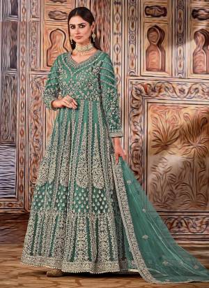 For A Beautiful Look,Grab These Anarkali Suit in All Over Fine Colored Pair With Bottom And Dupatta.These Top And Dupatta Are Fabricated On Butterfly Net Pair With Santoon Bottom.Its Beautified With Heavy Coading,Sequance Embroidery,Hand Work.