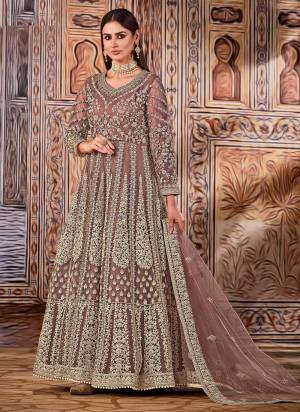 For A Beautiful Look,Grab These Anarkali Suit in All Over Fine Colored Pair With Bottom And Dupatta.These Top And Dupatta Are Fabricated On Butterfly Net Pair With Santoon Bottom.Its Beautified With Heavy Coading,Sequance Embroidery,Hand Work.