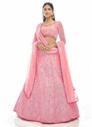 You Will Definitely Earn Lots Of Compliments Wearing This Heavy Designer Lehenga Choli In All Over Color. Its Pretty Blouse, Lehenga and Dupatta Are Fabricated On Fine Beautified with Embroidery Work. Buy This Elegant Peice Now.