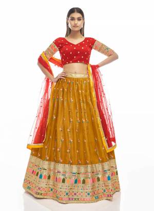 You Will Definitely Earn Lots Of Compliments Wearing This Heavy Designer Lehenga Choli In All Over Color. Its Pretty Blouse, Lehenga and Dupatta Are Fabricated On Fine Beautified with Embroidery Work. Buy This Elegant Peice Now.