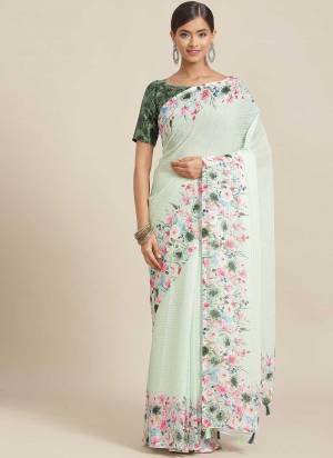 For A Beautiful Look,Grab These Saree in Fine Colored Pair With Blouse.These Saree is Fabricated On Georgette Pair With Art Silk Blouse.Its Beautified With Designer Printed,Embroidery Work.