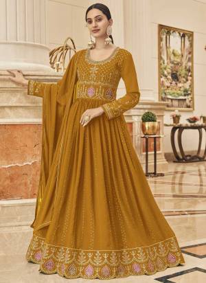 For A Looking Different,Grab These Suit in Fine Colored Pair With Bottom And Dupatta.These Top Is Fabricated On Faux Georgette Pair Santoon Bottom And Chiffon Dupatta.Its Beautified With Designer Work.