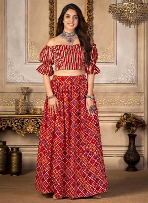 Grab These Beautiful Choli And Skirt in Fine Colored.These Choli And Skirt Are Fabricated On Moscow Silk.Its Beautified With Bandhani Printed Work.