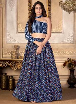 Grab These Beautiful Choli And Skirt in Fine Colored.These Choli And Skirt Are Fabricated On Moscow Silk.Its Beautified With Bandhani Printed Work.