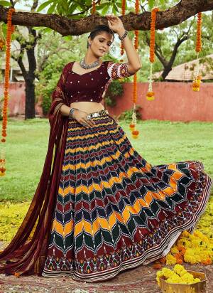 Grab These Traditional Lehenga in Fine Colored Pair With Blouse And Dupatta.These Lehenga Is Fabricated On Muslin Cotton Pair With Muslin Gajji Silk Blouse And Silk Dupatta.Its Beautified With Digital Printed,Designer Embroidery Work.