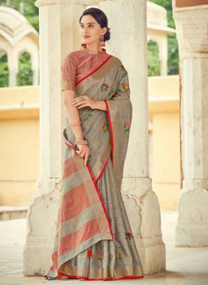 For A Beautiful Look,Grab These Saree in Fine Colored Pair With Blouse.These Saree And Blouse Are Fabricated On Linen.Its Beautified With Heavy Wevon Designer,Embroidery Work.