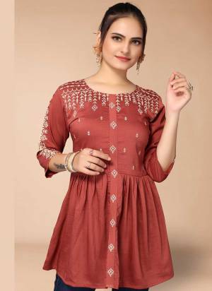 For A Casual Wear,Grab These Readymade Short Top in Fine Colored.These Top is Fabricated On Viscose Blend.Its Beautified With Thread Embroidery Work.Buy Now.