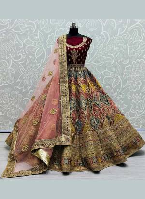 Grab These Heavy Designer Lehenga Choli in Fine Colored Pair With Blouse And Dupatta.These Blouse And Lehenga Are Fabricated On Velvet Pair With Soft Net Dupatta.Its Beautified With Heavy Designer Work.