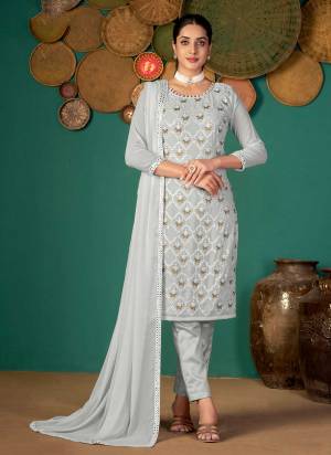 Grab These Beautiful Colored Suit.These Top And Dupatta Are Fabricated On Faux Georgette Pair With Santoon Bottom.ItsBeautified With Thread,Jari,Sequance Embroidery Work.