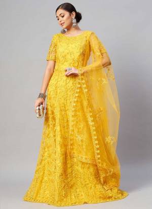 Grab These Gown in Fine Colored Pair With Dupatta.These Gown And Dupatta Are Fabricated On Net.Its Beautified With Thread Embroidery With Stone Work.