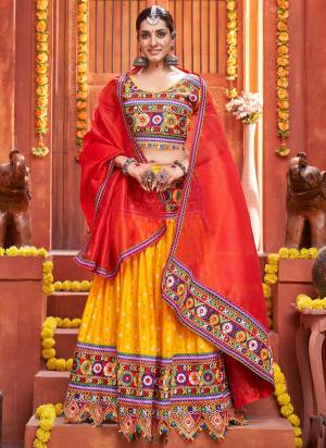 Grab These Beautiful Colored Lehenga Choli.These Lehenga And Blouse Are Fabricated On Cotton Silk Pair With Art Silk Dupatta.Its Beautified With Printed,Special Gamthi,Real Mirror Embroidery Work.