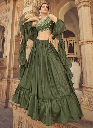 Grab These Beautiful Colored Lehenga Choli in Fine Colored Pair With Blouse And Dupatta.These Lehenga And Dupatta Are Fabricated On Chinon Pair With Art Silk.Its Beautified With Designer Thread,Mirror Embroidery Work.