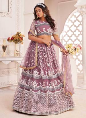 For A Different Look,Grab These Designer Lehenga in All Over Pretty Colored Pair With Blouse And Dupatta.These Lehenga Choli is All Over Butterfly Net Base Fabric With Designer Work.Buy Now These Lehenga For Up Coming Wedding Season