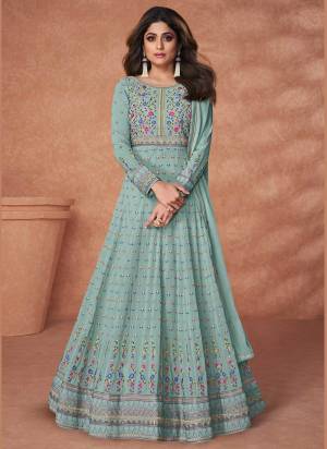 Grab These Suit in Beatiful Colored Pair With Bottom And Dupatta.These Top And Dupatta Are Fabricated On Georgette Pair With Santon Bottom.Its Beautified With Heavy Multy Thread Embroidery Work.