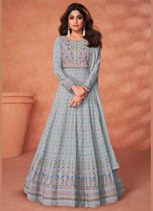 Grab These Suit in Beatiful Colored Pair With Bottom And Dupatta.These Top And Dupatta Are Fabricated On Georgette Pair With Santon Bottom.Its Beautified With Heavy Multy Thread Embroidery Work.