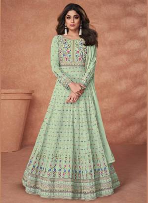 Grab These Suit in Beatiful Colored Pair With Bottom And Dupatta.These Top And Dupatta Are Fabricated On Georgette Pair With Santon Bottom.Its Beautified With Heavy Multy Thread Embroidery Work.