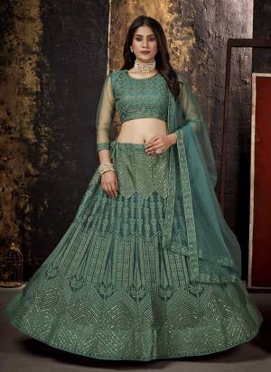 Grab These Beautiful Colored Lehenga Choli.These Lehenga and Blouse Are Fabricated On Net Pair With Net Dupatta.Its Beautified With Heavy Thread,Sequance Embroidery Work.