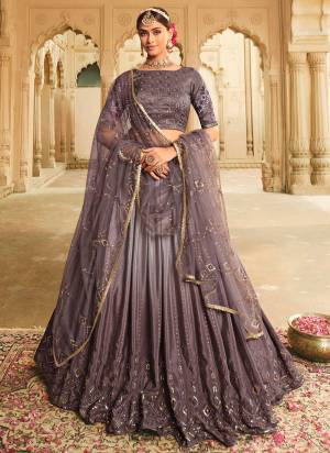 Grab These Beautiful Looking Lehenga Choli in Fine Colored.These lehenga And Blouse Are Fabricated On Silk Pair With Net Dupatta.Its Beautified With Heavy Designer Work.