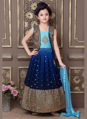 Grab These Readmade Kids Wear Lehenga Choli in Fine Colored.These Lehenga And Dupatta Are Fabricated On Georgette Pair With Georgette Koti And Faux Georgette Blouse.Its Beautified With Designer Jari,Sequance Embroidery Work.