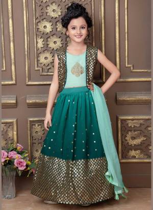 Grab These Readmade Kids Wear Lehenga Choli in Fine Colored.These Lehenga And Dupatta Are Fabricated On Georgette Pair With Georgette Koti And Faux Georgette Blouse.Its Beautified With Designer Jari,Sequance Embroidery Work.