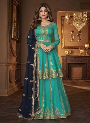 Flaunt Your Rich And Elegant Taste Wearing This Designer Suit in All Over Beautiful Colored.These Top And Bottom Are Fabricated on Georgette Based Pair With Georgette Dupatta.Its Beautified With Heavy Sequance Embroidery Work.