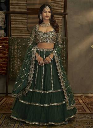 Bold And Beautiful Lookig Lehenga Choli is Here.These Lehenga And Blouse Are Fabricated On Soft Net Pair With Soft Net Dupatta.Its Beautified With Designer Work.